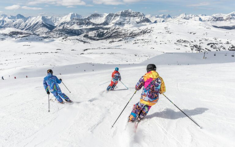 Grand Targhee Resort ski slopes with snow-capped Teton mountains in background, March skiing