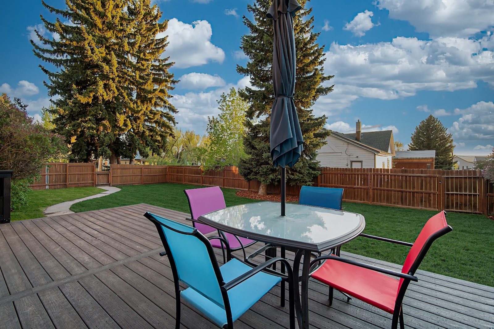 Private fenced backyard deck at The Barn in Driggs